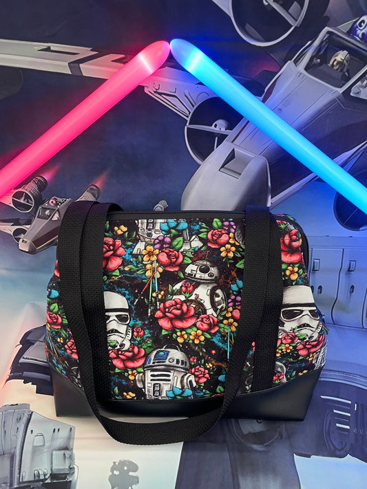 FLORAL WARS ...... large wire Frame bag featuring Black Faux leather bottom, custom print