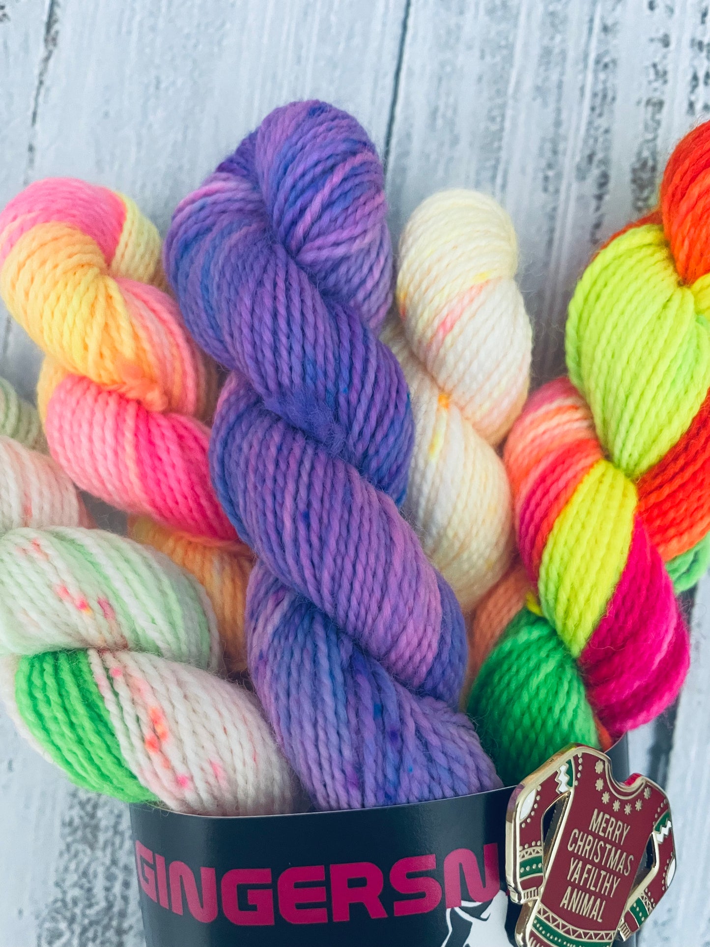 SANTA'S SH*TSHOW MINISNAP SET (5) WITH THEMED ENAMEL PIN ...LUSH FINGERING 2 PLY ( SPECIAL EDITION COLOURWAYS )..BLACK LIGHT REACTIVE