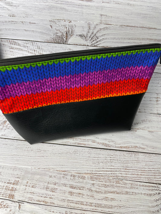 RAINBOW KNITTING  small Lifestyle bag (soft no wire  , but interfaced )..WITH A BLACK FAUX LEATHER BOTTOM ....CUSTOM PRINT