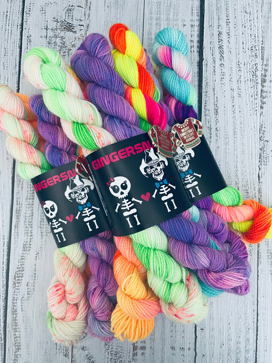 SANTA'S SH*TSHOW MINISNAP SET (5) WITH THEMED ENAMEL PIN ...LUSH FINGERING 2 PLY ( SPECIAL EDITION COLOURWAYS )..BLACK LIGHT REACTIVE