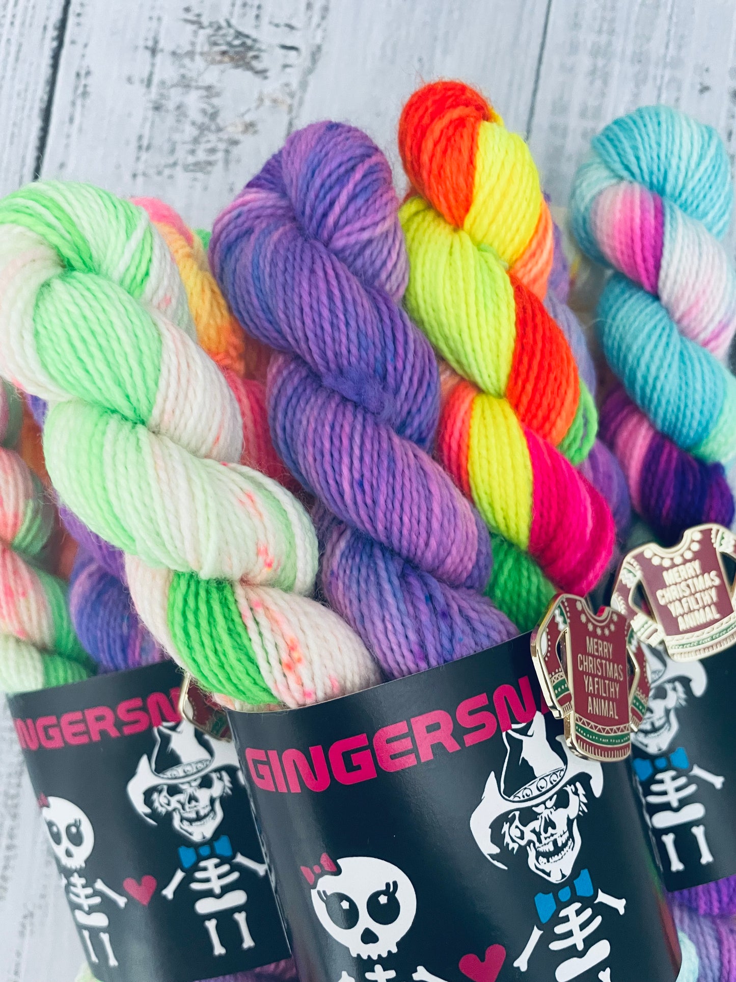 SANTA'S SH*TSHOW MINISNAP SET (5) WITH THEMED ENAMEL PIN ...LUSH  FINGERING 2 PLY ( SPECIAL EDITION COLOURWAYS )..BLACK LIGHT REACTIVE