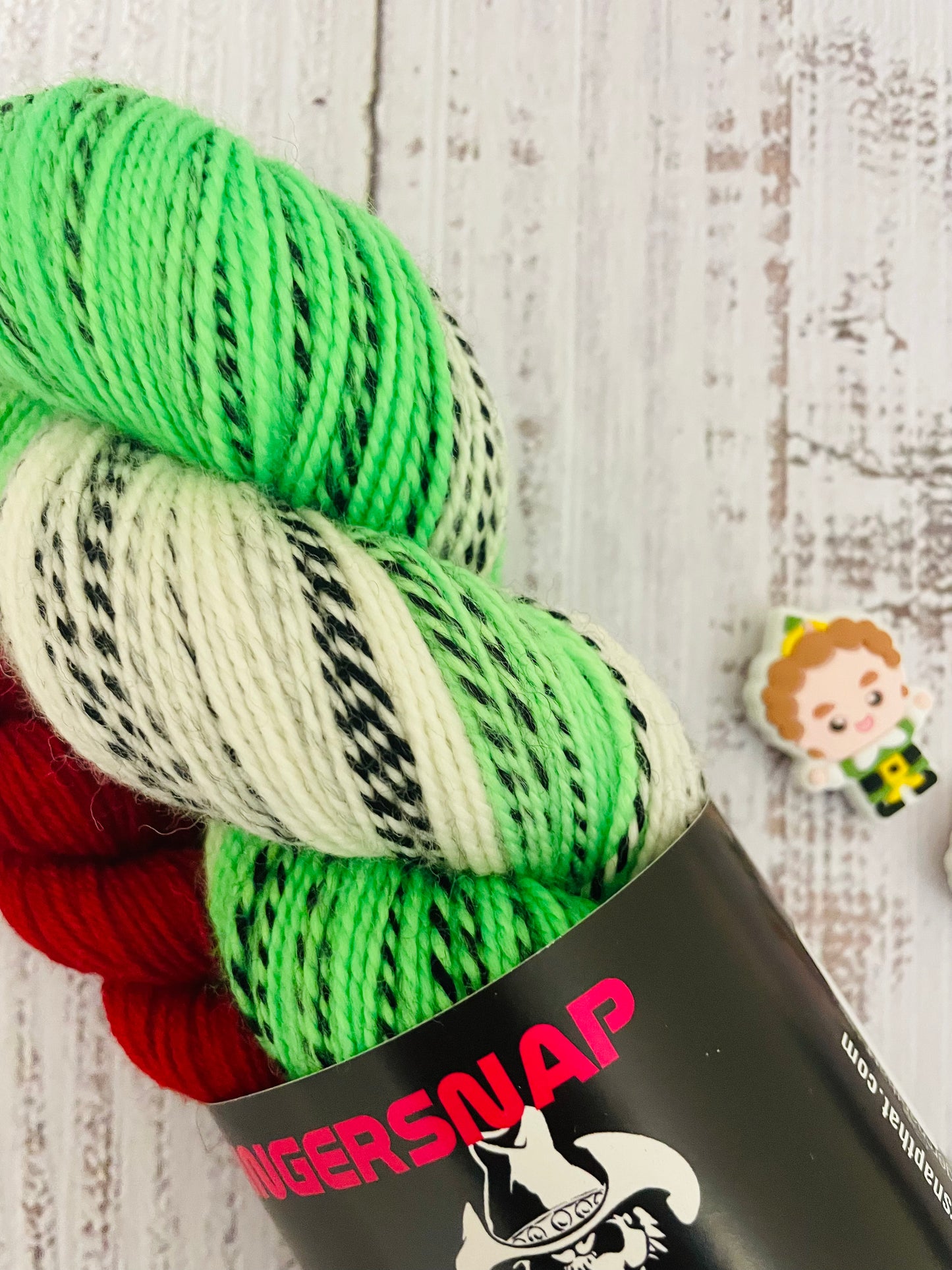 ELF YOURSELF  SOCKET (1) ZEBRA EFFECT...WITH THEMED STOTCH STOPPERS